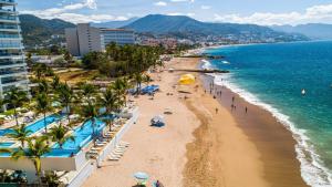Wake Up to Stunning Beach & Harbor Views