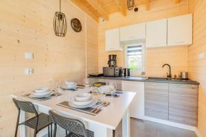 Domki Apartamentowe AURA
