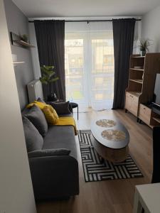 Apartament Grey 2 pokojowy z balkonem w Warszawie