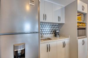 Dog-friendly Apartment with Rooftop Infinity Pool, Gym, Central AC & Balcony
