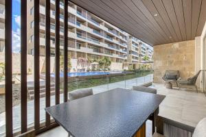 Peaceful Condo with Resort Pool, High-Speed WiFi & Relaxing Outdoor Space