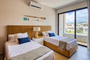 Peaceful Coastal Stay with Pool, Balcony & Fitness Center