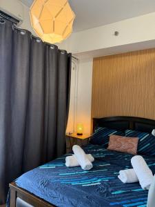 Cozy TriG Place near BGC at Grace Residence