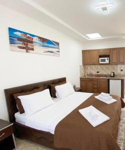 Button Aparthotel