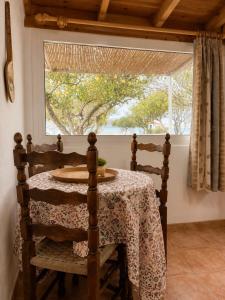 The simple two-bedroom house at Klima Beach