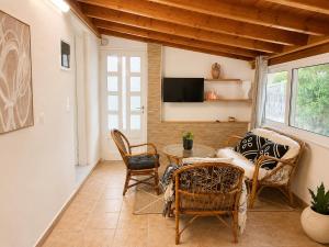 The simple two-bedroom house at Klima Beach