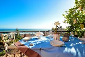 casa vista mare con wifi, AC nelle 4 camere da letto e parcheggio privato