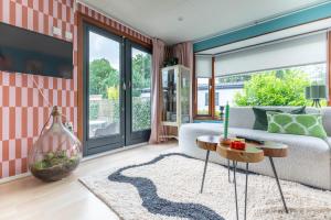 Bosgeluk Veluwe Familiechalet met Tuin nabij Bos en Zwembad