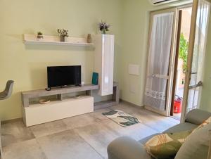 Appartamento Salvia, veranda e giardino a 75 m dal mare