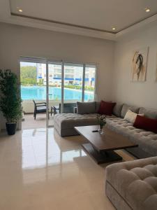 Appartement pour familles avec grande piscine et plage à proximité