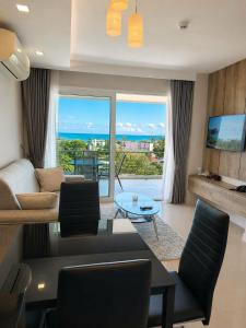 Sea View Condo 1 Bedroom and Sofa Bed Rooftop Pool in Rawai