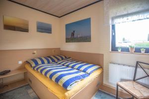 Ferienhaus Hassel - Hinter dem Deich Tossens