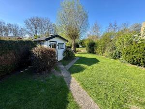 Ferienhaus Hassel - Hinter dem Deich Tossens
