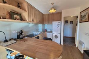 Appartement familial au Revard vue sur le jardin denfant et pistes