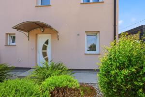 Holiday house "Sabine pink" with heated pool