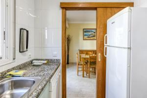 Casa con piscina comunitaria