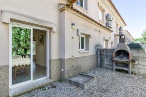 Casa con piscina comunitaria