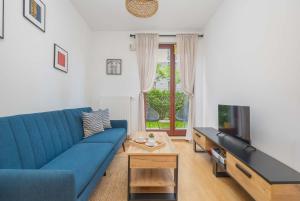 Bright Apartment with a Garden Near the PGE Narodowy by Noclegi Renters