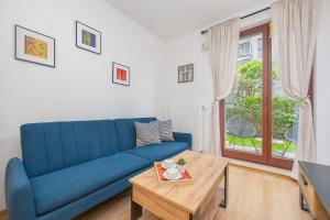 Bright Apartment with a Garden Near the PGE Narodowy by Noclegi Renters