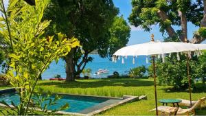 Villa Tropicale paradisiaque en bord de mer avec piscine privée à Nosy Be