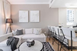 Free housekeeping visits during your stay - StayShort - Modern Marina Living - Stylish 1BR Apartment