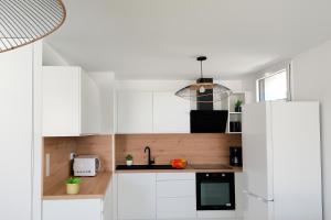Evasion chic au coeur de la ville et proche plage - Garage privé - Deux chambres