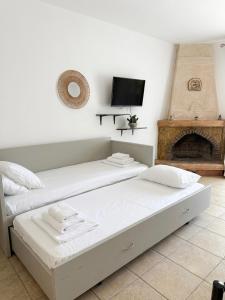 Iris Maisonettes and Studios