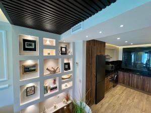 Boutique-Style Apartment with Terrace & Beach View
