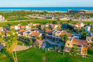 Beautiful house with a pool, golf course, and beach