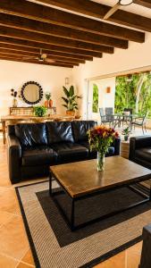Beautiful house with a pool, golf course, and beach