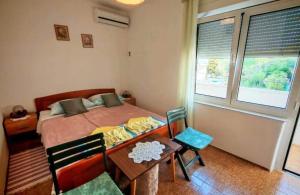 Apartments with parking space Barbat, Rab - 27424