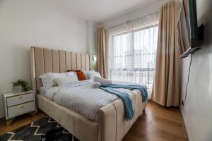 The modern executive serene suites with amazing breathtaking city views ,fully equipped gym , swimming pool and private ample parking space