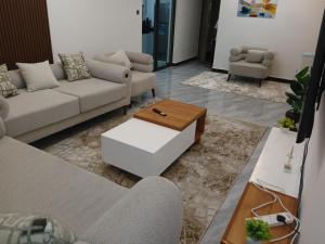 newly furnished two bedroom apartment with swimming pool, fully equipped gym, private parking space ,children playground and unbeatable scenic city views