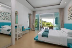 Amala Grand Bleu Resort Hilltops