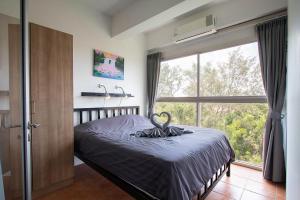 Beachside 1BR Condo with Rooftop Pool - Mae Phim