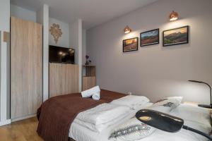 Zakopiański Luksus - Apartamenty Zakopiańskie - Jacuzzi & Sauna & Siłownia & Plac Zabaw
