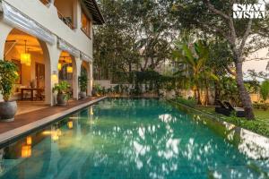 StayVista at Villa Rumjhum - Pool, BBQ & Bonfire