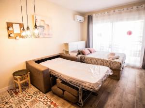 Bella Aura Acogedor Estudio con Terraza en el Centro