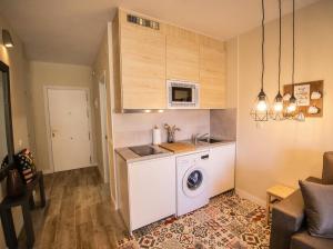 Bella Aura Acogedor Estudio con Terraza en el Centro
