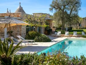 Magical trullo with panoramic view of ancient town
