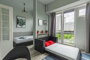 Warsaw Centrum Grzybowska Exclusive Apartment High Ceilings View by PolandBnB