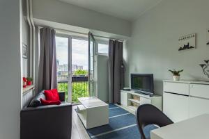 Warsaw Centrum Grzybowska Exclusive Apartment High Ceilings View by PolandBnB