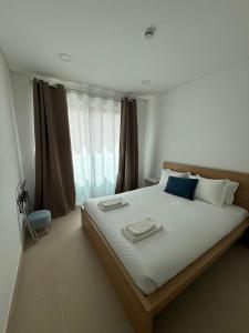 TERRA Blue Brand New 1BR w Private Garage