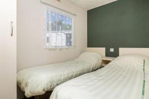 Two-Bedroom Chalet room in Oostappen Vakantiepark Blauwe Meer NV