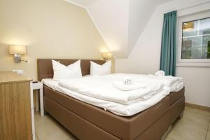 Strandresort Rex Rugia Ferienwohnung 11-5 mit Sauna- und Schwimmbadnutzung im AHOI Sellin
