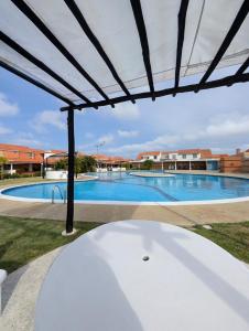 Townhouse Familiar en Playuela, Piscina Privada