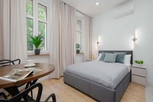 Klimatyzowane Apartamenty typu Studio Blisko Centrum i Starego Browaru by Noclegi Renters
