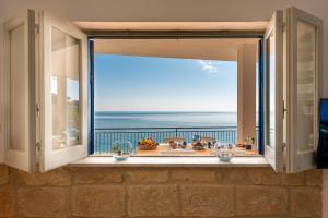 Grecale Beachfront Apartment direct beach access