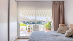 Golf Course views Ibiza style apartment