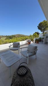 Golf Course views Ibiza style apartment